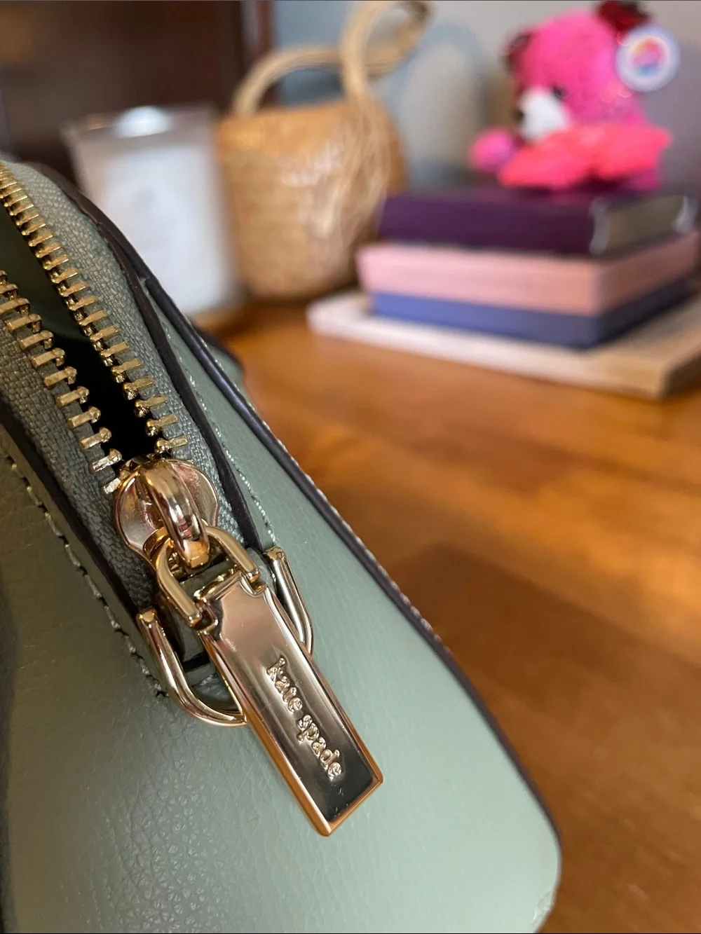 The Kate Spade KK114 refers specifically to the Phoebe East West Satchel